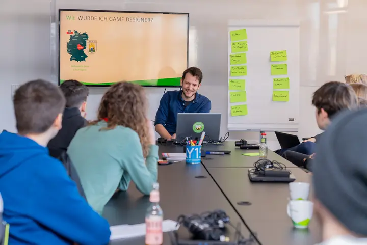 A game designer giving a talk about how he became a game designer
